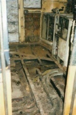 The interior of No.2 cab prior to and after stripping. On the right, the cab approaches completion in December 2006